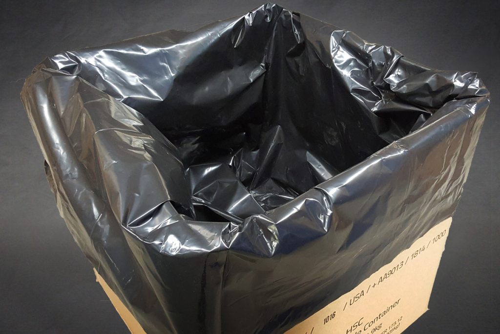black trash bag lining cardboard box